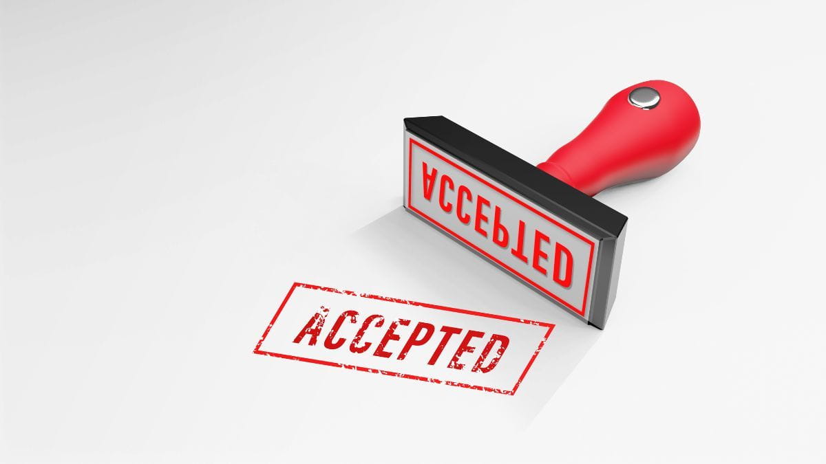 red accepted stamp on white background